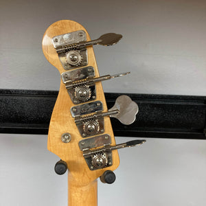 The back of a Fender American Vintage '62 Precision Bass Olympic White 2005 shows four Schaller-branded tuners on light wood—a classic detail of this Fender vintage reissue.