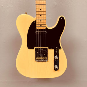 A Fender Custom Shop '51 Reissue Nocaster NOS 2006 electric guitar in a light finish with a black pickguard, maple neck, and two control knobs is shown against a plain light gray background.