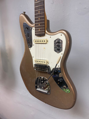 Fender Custom Shop Jaguar Journeyman electric guitar, close-up view showcasing its intricate craftsmanship and vintage relic finish.