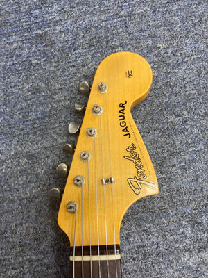 Close-up of a Fender Custom Shop Jaguar Journeyman guitar, highlighting the intricate craftsmanship and vintage detailing of this limited edition model.