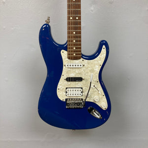 Fender MIM Stratocaster Blue 1998 with case, featuring a blue finish and versatile pickup configuration. Well-used with finish blemishes.