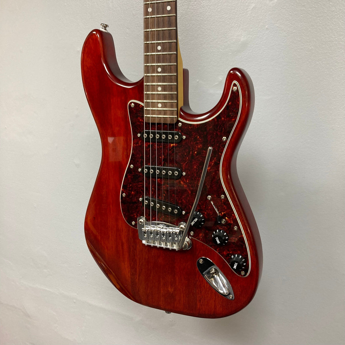 G&amp;L Tribute Series S-500 Irish Ale used, featuring a red electric guitar with a maple neck, rosewood fingerboard, and advanced pickup system.