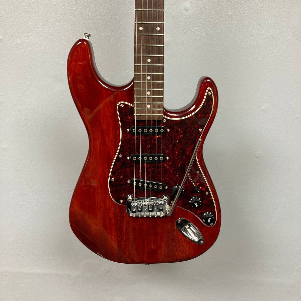 G&amp;L Tribute Series S-500 Irish Ale Used: A red electric guitar with advanced pickups and versatile controls, designed by Leo Fender.