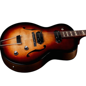 The Godin 5th Avenue Kingpin II DLX Vintage Burst HG SF is a semi-hollow electric guitar with a sunburst finish, P90 single-coil pickups, f-holes, two control knobs, and part of the neck visible—highlighting Godin’s Canadian craftsmanship.