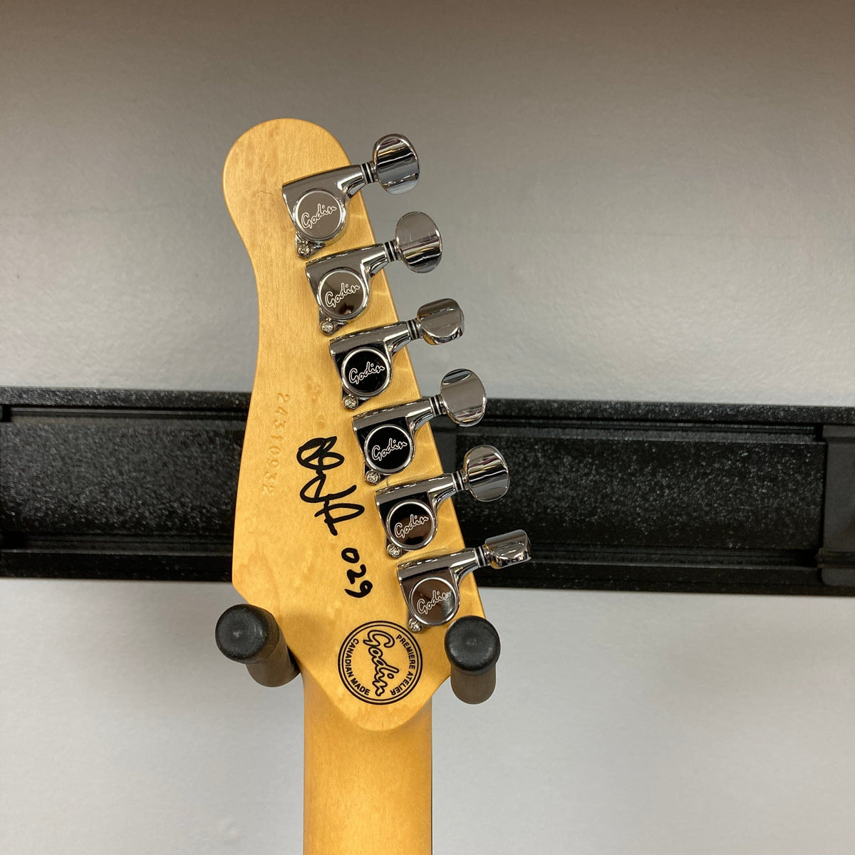 Godin LERXST Grace Red LTD I w/Floyd Rose, featuring a close-up of the guitar neck with intricate details, showcasing its craftsmanship and design excellence.