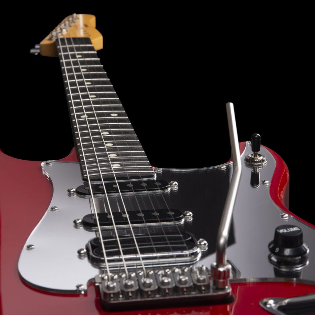 Godin LERXST Grace Red LTD I guitar close-up, showcasing the neck and volume knob, highlighting its craftsmanship and signature style for discerning musicians.