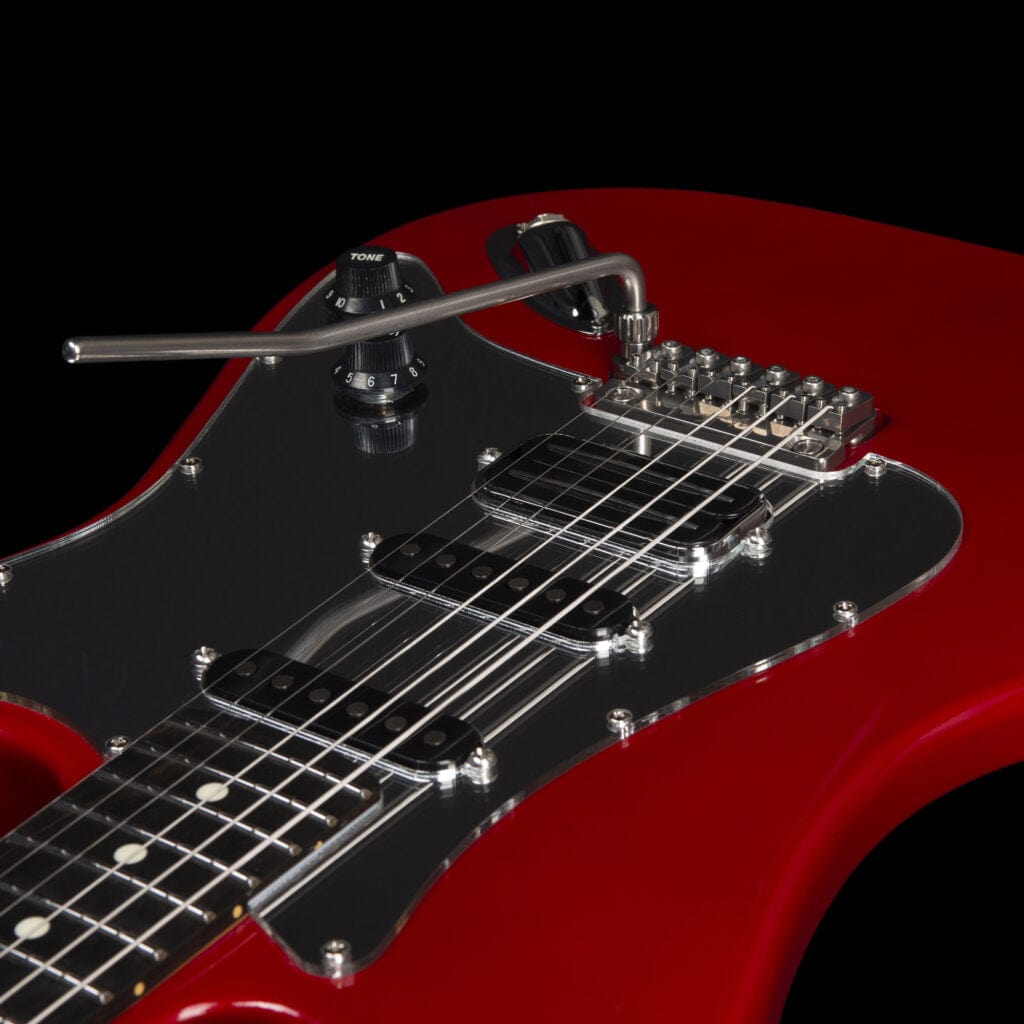 Godin LERXST Grace Red LTD I w/Vega Trem electric guitar, showcasing strings, dials, and a maple neck, embodying modern craftsmanship and Alex Lifeson&#39;s signature style.