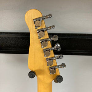 Close-up of the Godin Passion Custom Whiskey Burst guitar, highlighting its intricate craftsmanship and innovative pickup features.