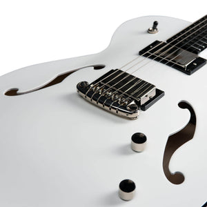 Close-up of a white Godin Rik Emmett Premiere Electric Guitar body by Godin, highlighting the f-holes, bridge, pickup, control knobs, and a portion of the fretboard on this limited edition model.