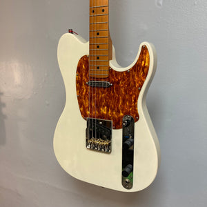 Godin Stadium Pro Ozark Cream MN Electric Guitar, showcasing a high-gloss finish, maple neck, and dual pickups for versatile sound.