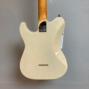 Godin Stadium Pro Ozark Cream MN electric guitar mounted on a wall, showcasing its high-gloss finish and premium pickups.