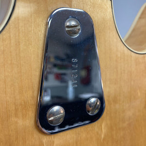 Close-up of the Hagstrom Viking 1968 Natural guitar, highlighting its vintage craftsmanship and intricate details, with minor finish blemishes.