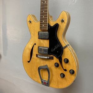 Hagstrom Viking 1968 Natural w/Case, close-up of guitar strings and volume knobs, showcasing its vintage design and craftsmanship.