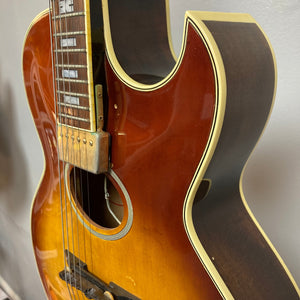 Close-up of the Ibanez Starfield hollow body guitar, highlighting its elegant design, hollow body construction, and single humbucker neck pickup.