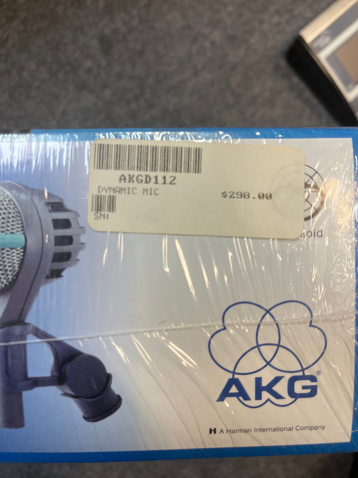 AKG D112 Dynamic Microphone NOS by AKG, boxed and wrapped in plastic, with a $298.00 price label attached.