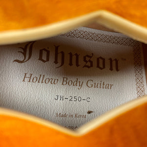 Johnson JH-250-C Semi Hollow Cherry Burst guitar label, highlighting model details and craftsmanship close-up. Perfect for enthusiasts at Guitars on Main.