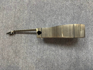 A side view of the Klos Grand Cutaway AE w/Fishman acoustic ukulele rests on a gray carpet, showcasing the body and neck of this premium Klos instrument.