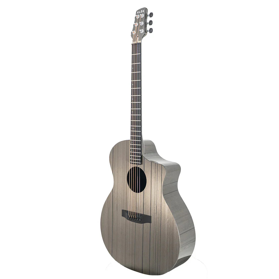 The Klos Grand Cutaway Carbon Timber w/K&K PUP is a modern six-string acoustic guitar with a metallic gray body, vertical lines, black bridge and fretboard, and cutaway design for easy access—delivering resonant sound.