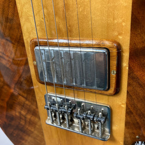 Close-up of the 1986 Kramer 650G Deluxe guitar, showcasing its detailed craftsmanship and vintage design.