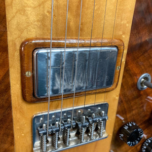 Close-up of a 1986 Kramer 650G Deluxe guitar, showcasing its high-quality pickups and detailed craftsmanship.