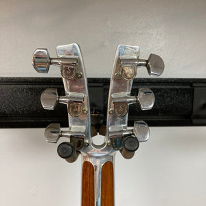 Close-up of the Kramer 650G Deluxe 1986 guitar headstock, showcasing its vintage craftsmanship and precision.