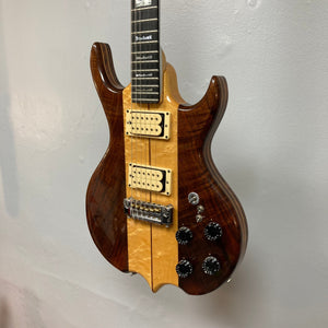 Kramer DMZ 6000-G Natural guitar with aluminum neck, maple body, Ebonal fingerboard, and DiMarzio humbucker pickups. Includes close-ups of bridge and control knobs.