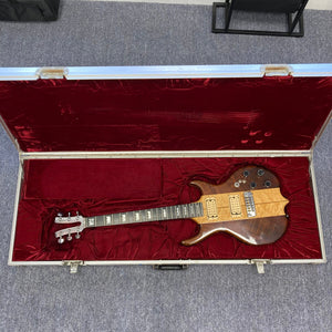 Kramer DMZ 6000-G Natural electric guitar in a case, featuring an aluminum neck with wooden inlay and two DiMarzio humbucker pickups.