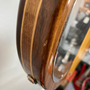 Kramer DMZ 6000-G Natural guitar close-up, showcasing the aluminum neck with wooden inlay and DiMarzio humbucker pickups.