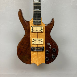 Kramer DMZ 6000-G Natural electric guitar with T-style aluminum neck, wooden inlay, maple body, DiMarzio Dual Sound pickups, and four control knobs.