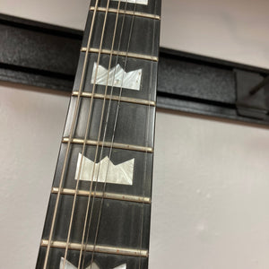 Close-up of Kramer DMZ 6000-G Natural guitar neck and strings, showcasing aluminum neck with wooden inlay and DiMarzio Dual Sound pickups.