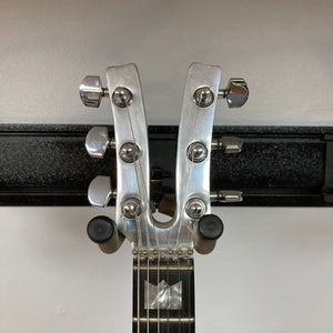 Close-up of the Kramer DMZ 6000-G Natural guitar headstock with knobs and metallic hardware.