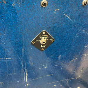 Kustom K200-B2 Blue Head and Cabinet Amp with visible screws on a blue surface.