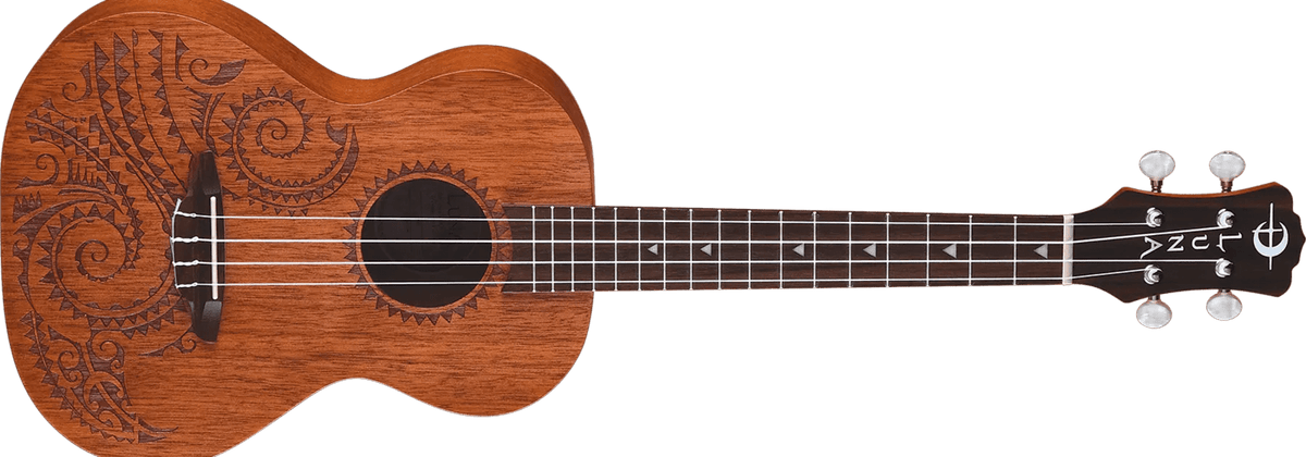 Close-up of Luna Tattoo Mahogany Tenor Ukulele featuring intricate Hawaiian wave and shark teeth laser etchings.