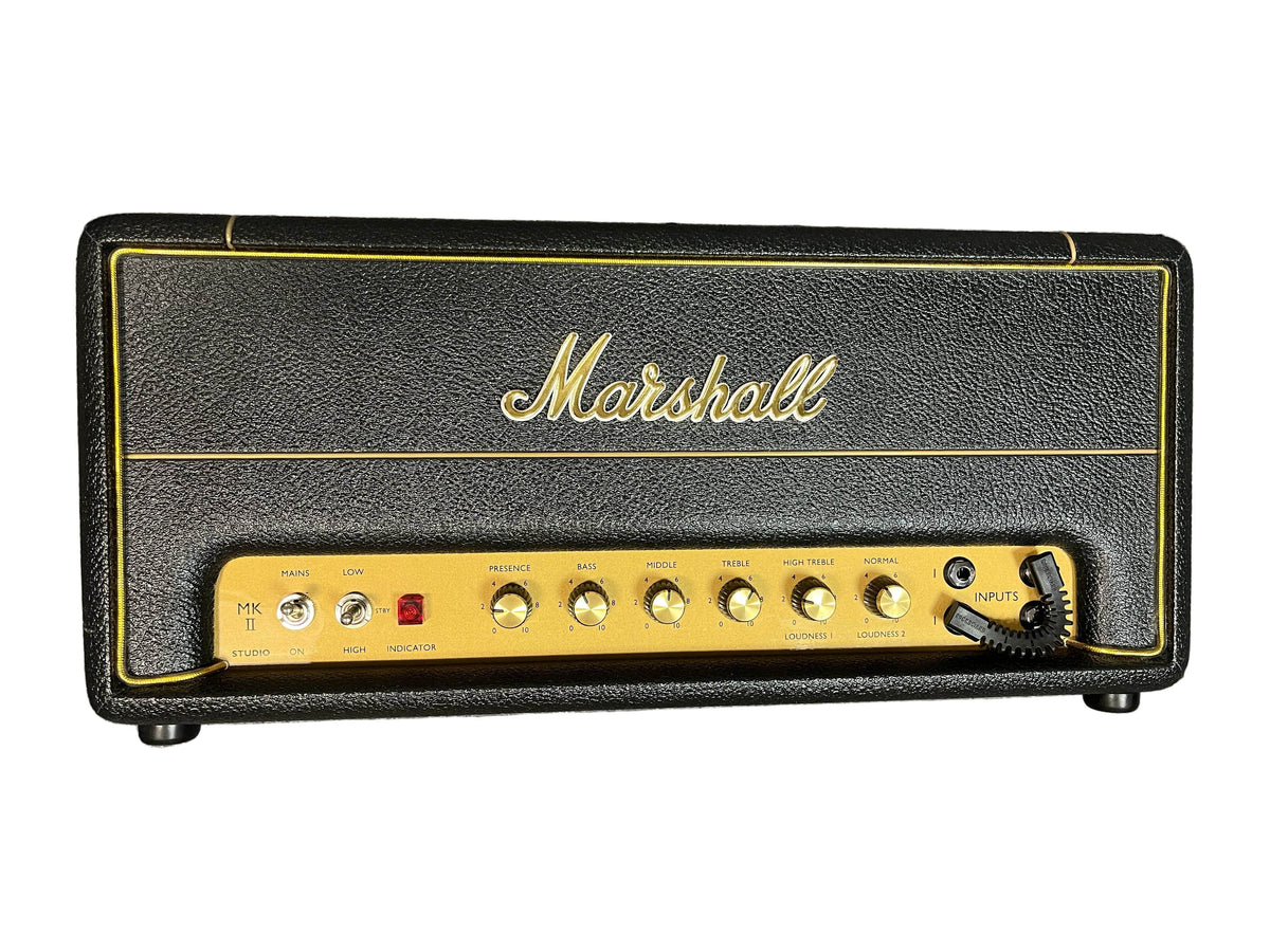 The Marshall Studio Vintage SV20H MKII 20/5-Watt Tube Head features classic Plexi tone, front-panel control knobs, switches, a red power light, input jacks, and the iconic Marshall logo on its stylish black and gold design.