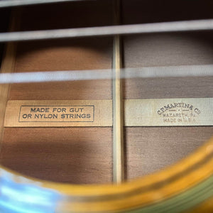 Close-up of the Martin 00-18G Classical Guitar (c. 1961–1962) interior label, reading “MADE FOR GUT OR NYLON STRINGS” and “C.F. MARTIN & CO. NAZARETH, PA. MADE IN U.S.A.”—classic features of this Martin instrument.
