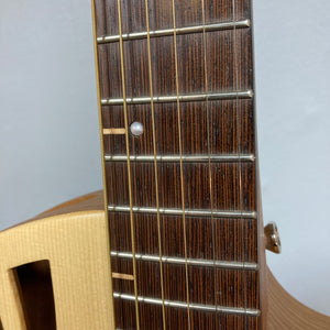 Murray Kuun Coupe Natural Acoustic Guitar, featuring a close-up of its neck and strings, highlighting intricate craftsmanship and design.