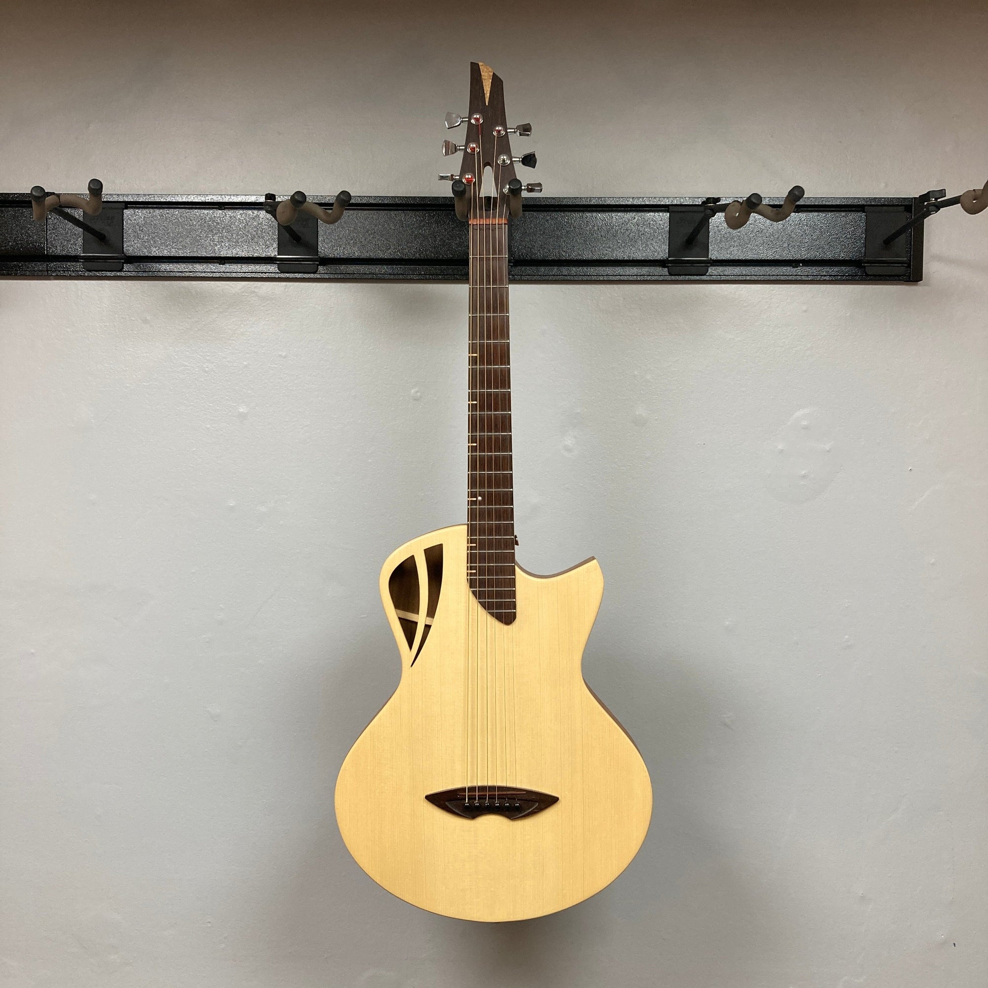 Murray Kuun Coupe Natural Acoustic Guitar, detailed close-up showcasing strings and craftsmanship, perfect for music enthusiasts seeking quality instruments from Guitars on Main.