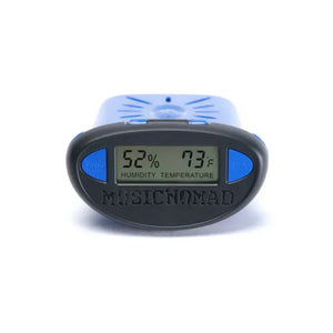 The Music Nomad The Humitar ONE – Acoustic Guitar Humidifier & Hygrometer displays 52% humidity and 73°F, features "MAX MIN" and "HOLD" buttons, and is perfect for use with an acoustic guitar humidifier.