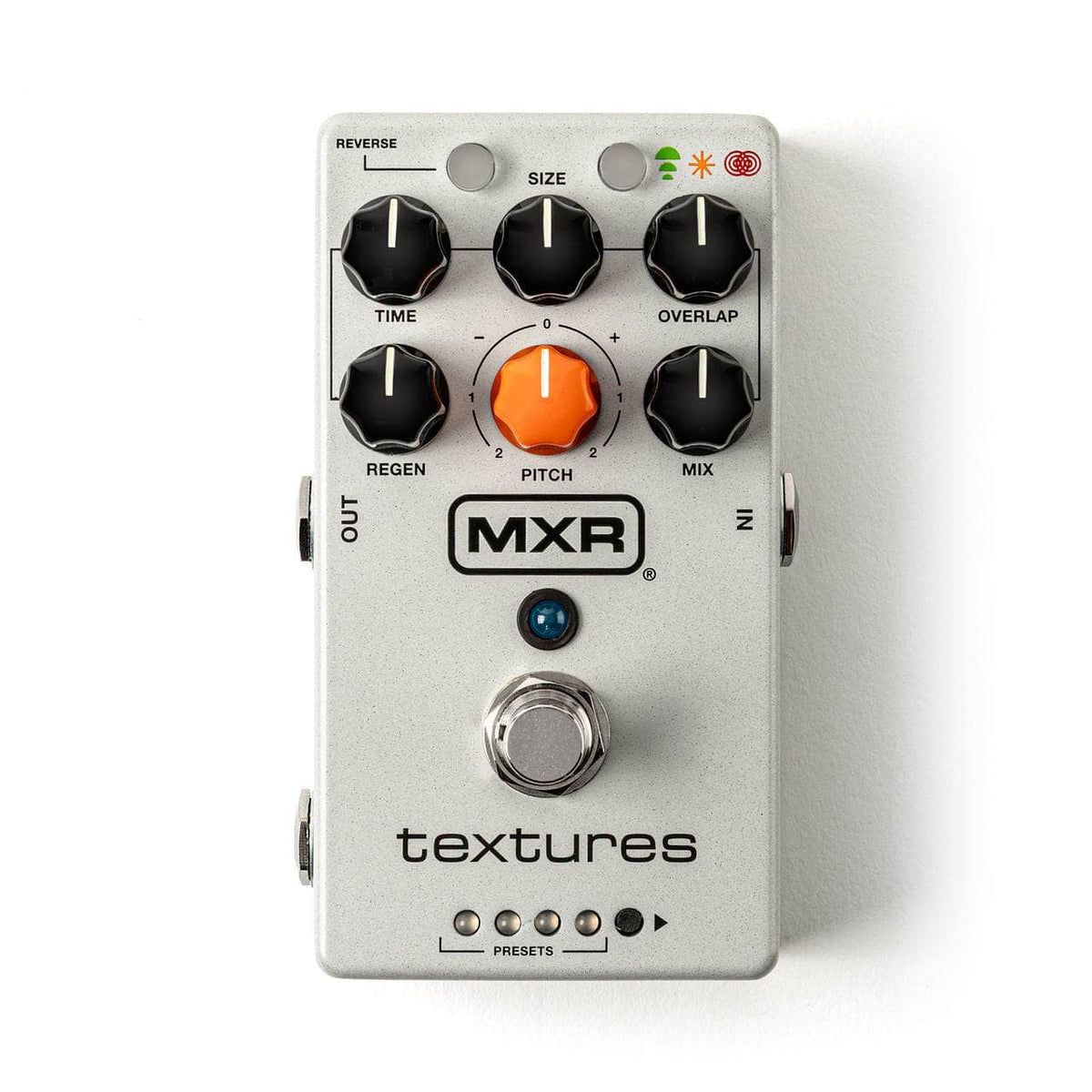 The MXR Textures M310 Pedal by MXR features a sleek silver design with five black knobs, one orange knob, a footswitch, three small indicator lights, and input/output jacks—ideal for creating immersive soundscapes or experimenting with granular synth-inspired effects.
