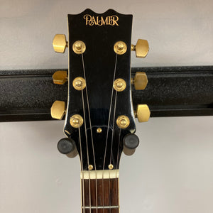 Palmer Semi-hollow 1970-80s ES-335 guitar head with gold knobs, showcasing vintage-style hardware and quality craftsmanship.