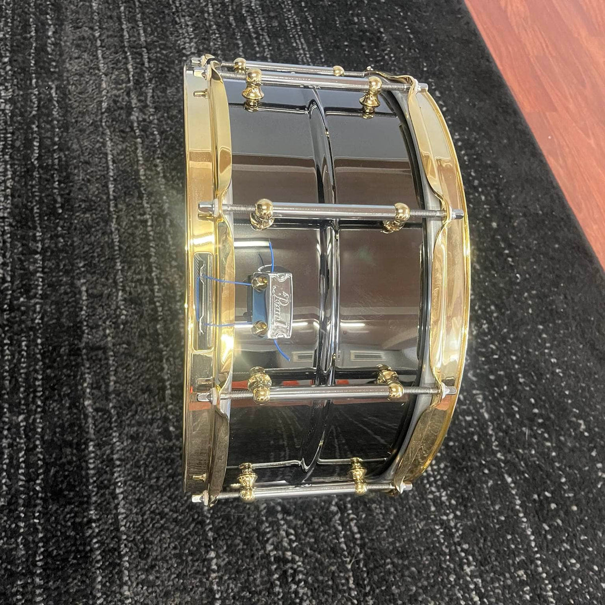 Pearl Steve Ferrone Signature Series snare drum with black nickel shell and gold hardware