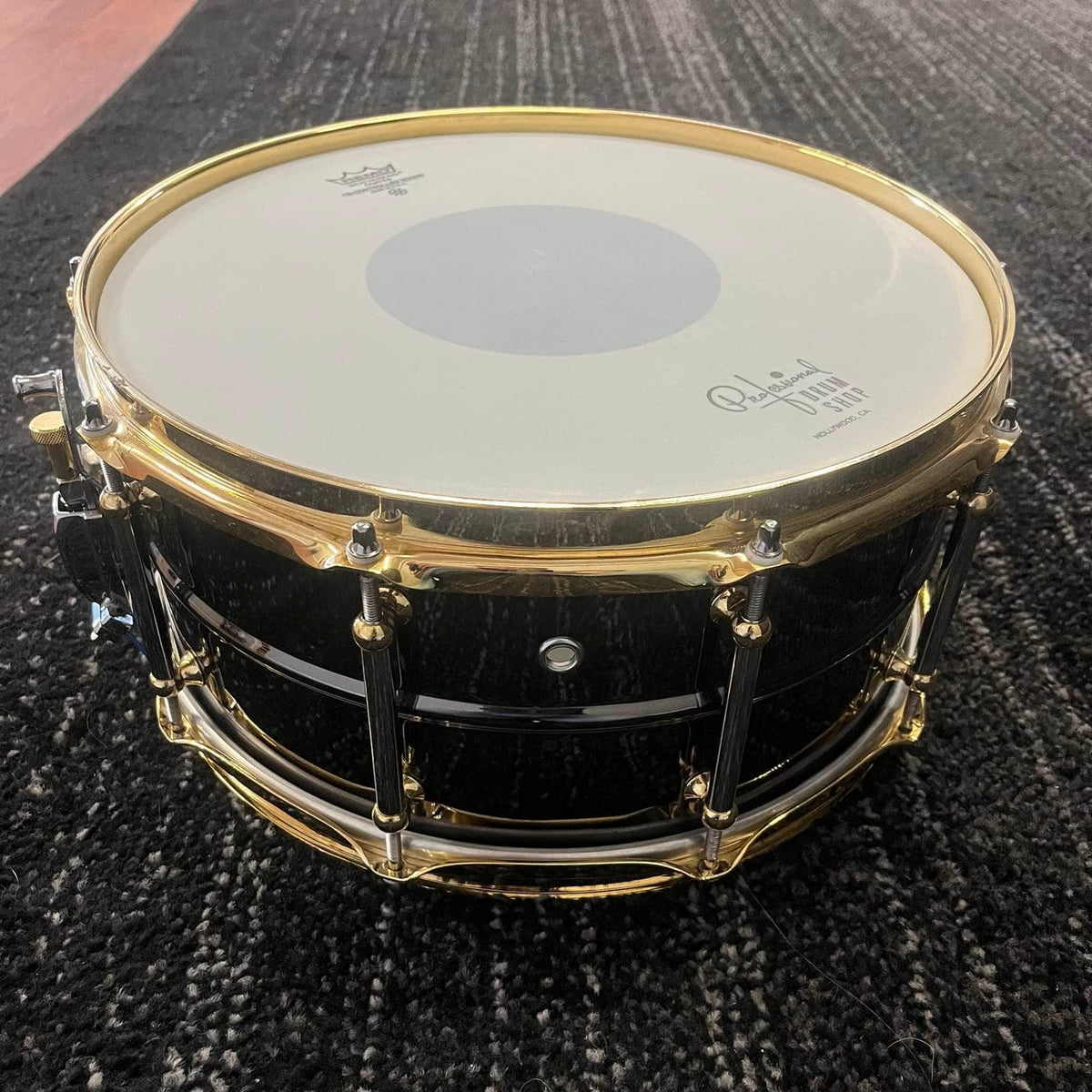 Pearl Steve Ferrone Signature Series snare drum with black nickel shell and gold hardware