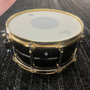 Pearl Steve Ferrone Signature Series snare drum with black nickel shell and gold hardware