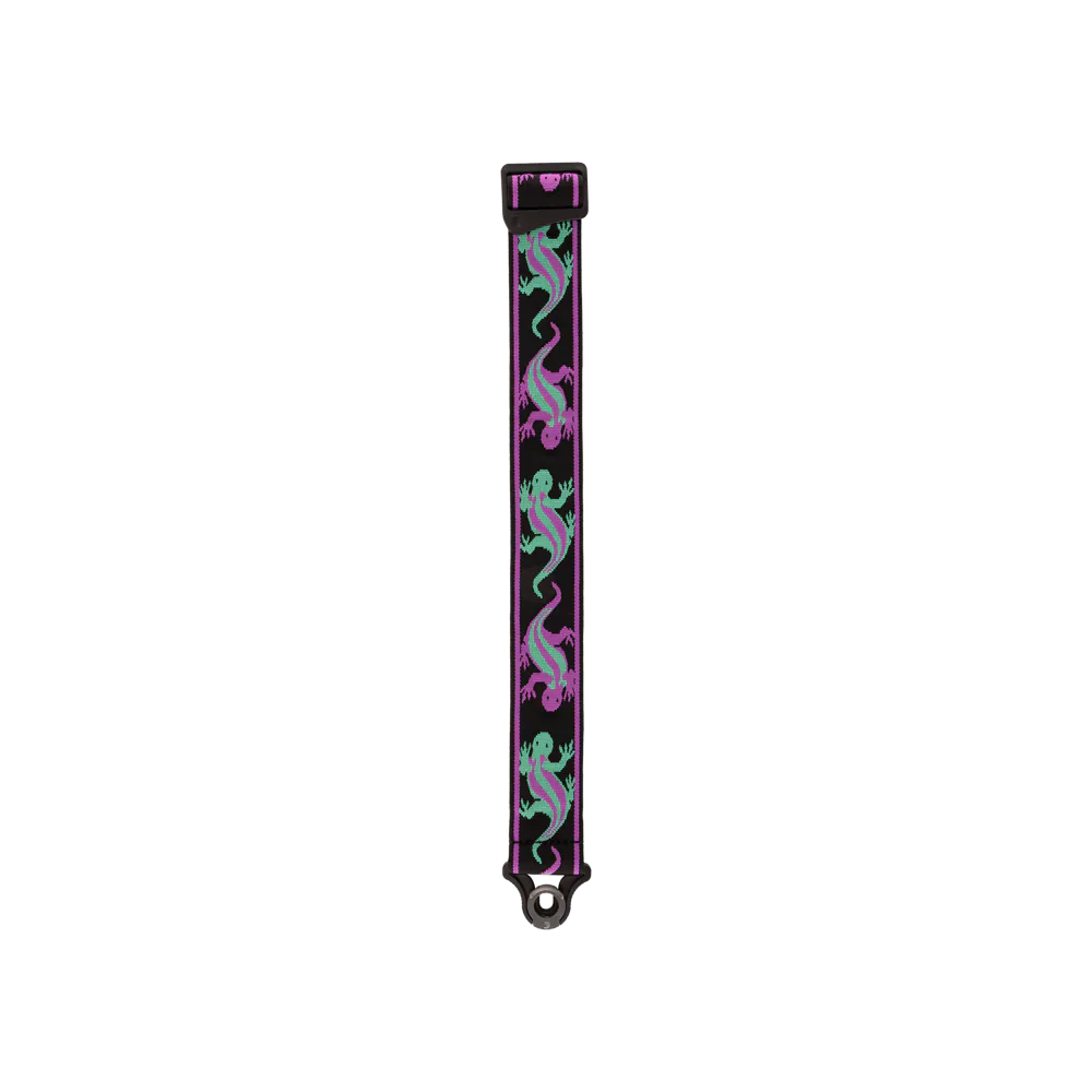 The Planet Waves Auto Lock Guitar Strap in green and purple lizards pattern features a sturdy design reminiscent of a stylish keychain strap, finished with a durable metal ring at the end.