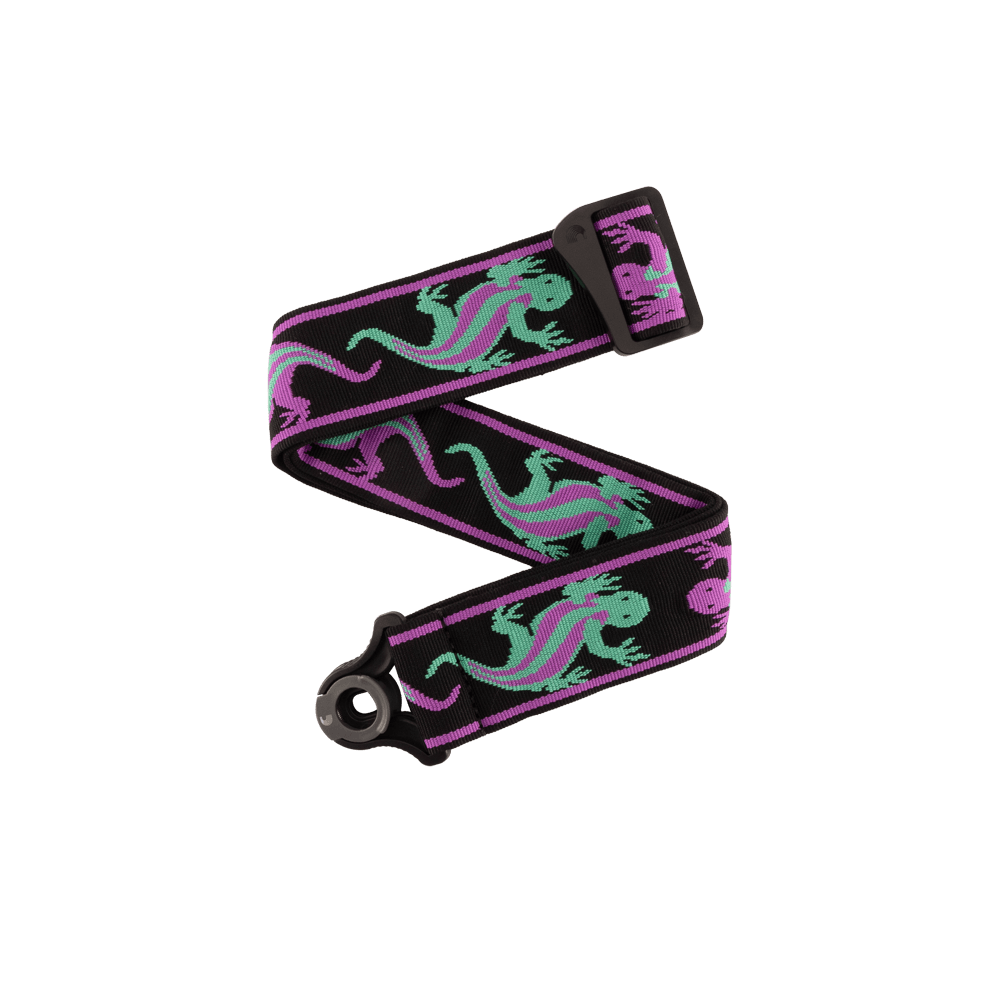 The Planet Waves Auto Lock Guitar Strap features green and purple lizard designs on a black and purple strap, with a plastic buckle and eyelet—ideal for fans of unique guitar accessories.