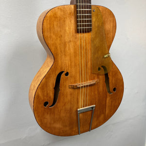 Playtime by Harmony Vintage Archtop Guitar 1940's, showcasing close-up details of strings and body, ideal for musicians and collectors.