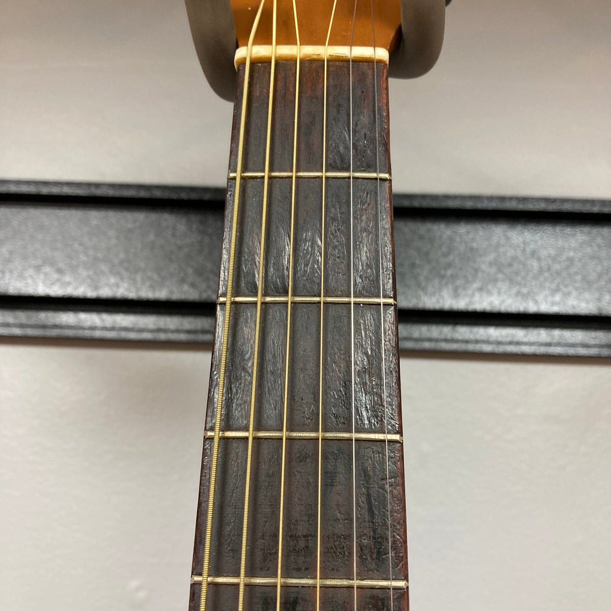 Close-up of the Playtime by Harmony Vintage Archtop Guitar 1940&#39;s neck, showcasing its quality strings and craftsmanship, ideal for musicians and collectors.