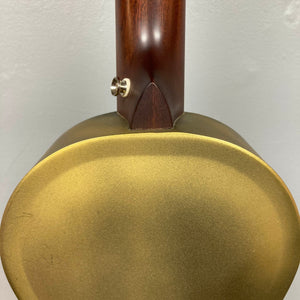 Close-up of the back of a Republic Parlor Resolian Antique Bronze Resonator, highlighting its gold-colored antique bronze resonator and wooden neck, set against a plain light background.