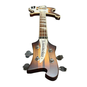 A close-up of a Rickenbacker 4003 Bass 2022 Autumnglo Checkerboard Binding OHSC, highlighting the headstock, tuning pegs, and neck with its Autumnglo finish, set against a white background.