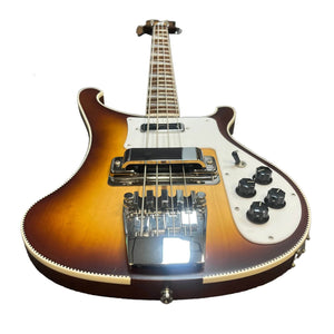 A collector-owned 2022 Rickenbacker 4003 Bass in Autumnglo with checkerboard binding and OHSC, featuring four strings and chrome bridge, is photographed from a low angle against a white background.